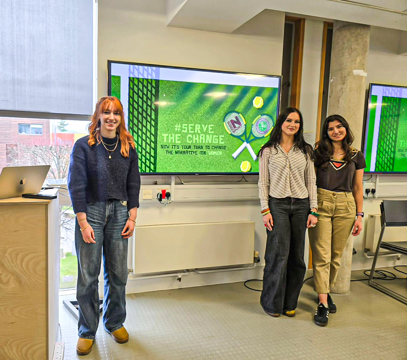 An image of me, Esmé and Antonia presenting our final pitch deck