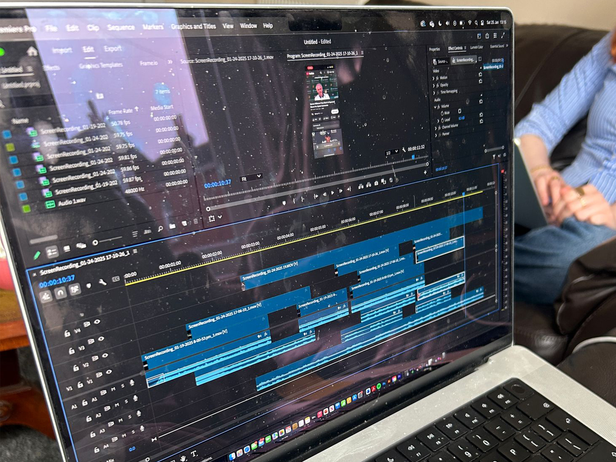 Laptop screen showing sound design on Adobe PremierePro